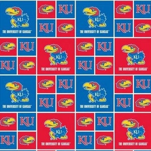 May include: Red and blue fabric with a repeating pattern of the University of Kansas Jayhawk mascot and the letters "KU".