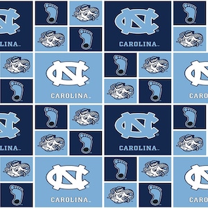 NCAA NORTH CAROLINA TARHEELs Patchwork Print #1 100% cotton college football fabric material  licensed for Crafts, Quilts