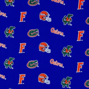 NCAA University of FLORIDA GATORS Allover Print Football 100% cotton fabric material you choose length licensed Quilts, Crafts & More