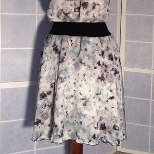 Wide trapeze elastic waist skirt in floral polyester in blue and black gray tones