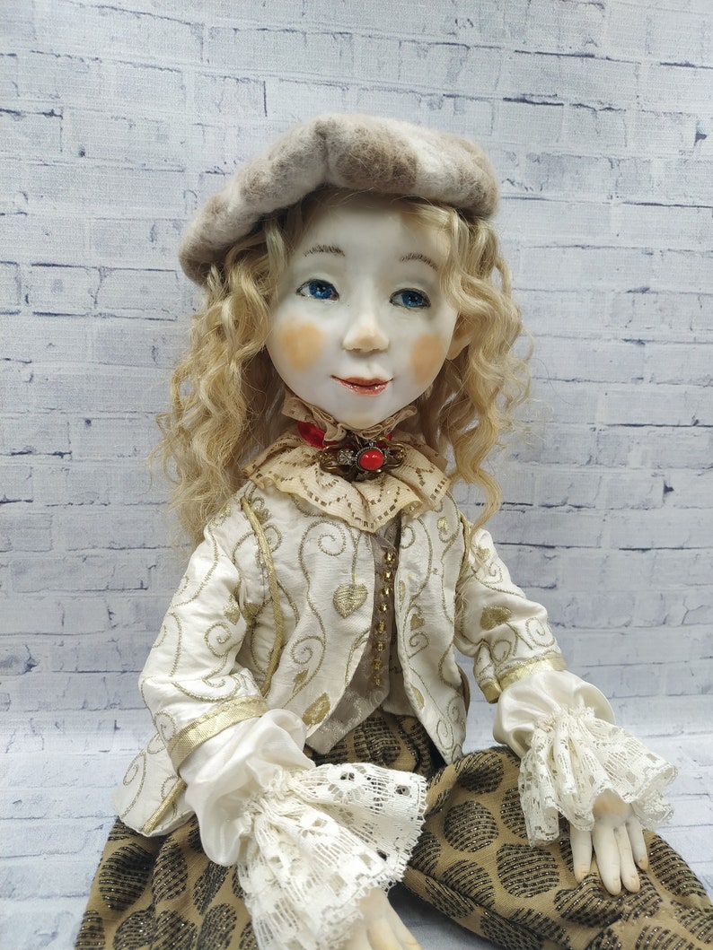 Movable interior doll is an original handmade gift. Etsy