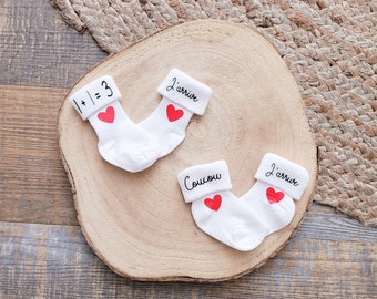 Customizable white socks for baby - pregnancy announcement theme