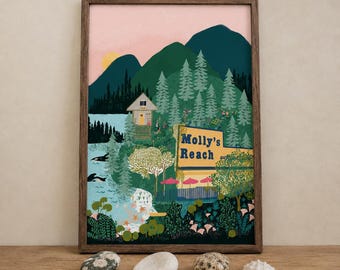 May include: A framed art print featuring a landscape with dark green mountains, a forest of pine trees, and a light pink sky. A building labeled Molly's Reach stands near a body of water with two orcas. The scene includes foliage and pink umbrellas.