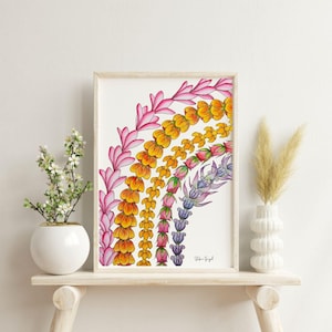 May include: A framed art print featuring a colorful floral design in a rainbow arc. The artwork showcases a variety of flowers in shades of pink, yellow, orange, and purple. The print is displayed on a light-colored wooden shelf.