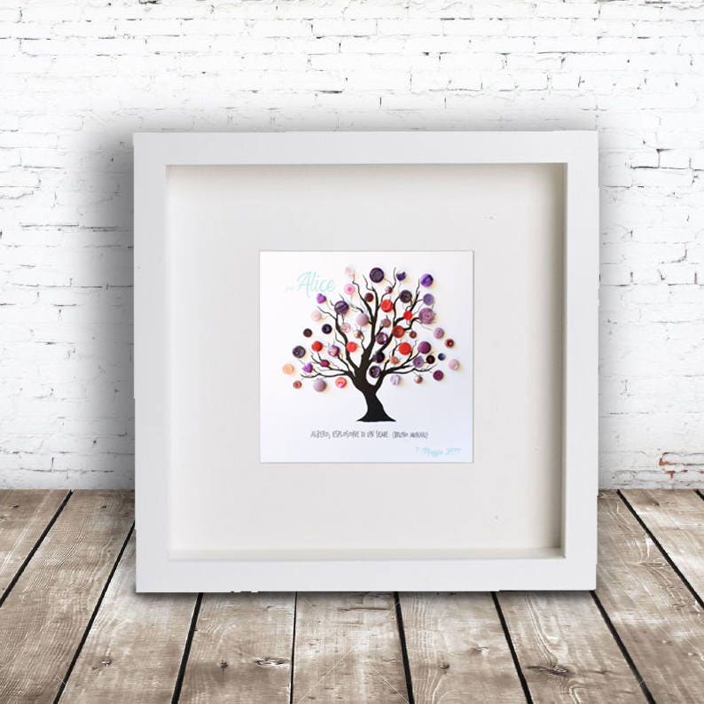 May include: A white framed picture with a black silhouette of a tree with purple, pink, and red buttons on the branches. The name "Alice" is written in blue above the tree. The text "Always remember you are braver than you think" is written below the tree.