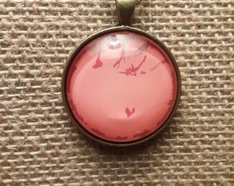 Coral and red designed glass pendant