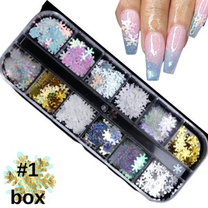 May include: A set of 10 boxes of iridescent snowflake nail glitter. Each box contains a different color and size of snowflake glitter. The glitter is perfect for adding a touch of sparkle to your nails.