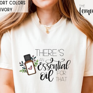 Essential Oil Shirt for Advocates Holistic Healing Aromatherapy Essential Oils Floral Accents Around Oil Bottle Natural Oil Remedies