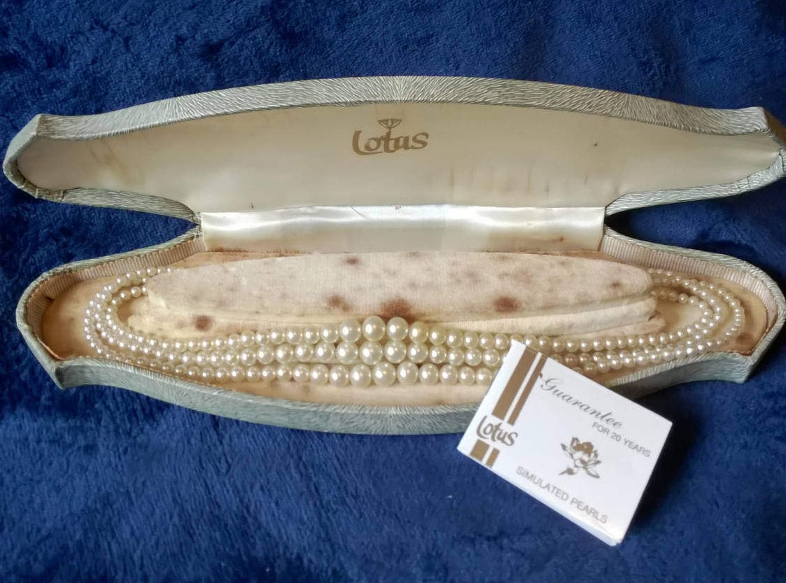 Lotus simulated pearl necklace deals