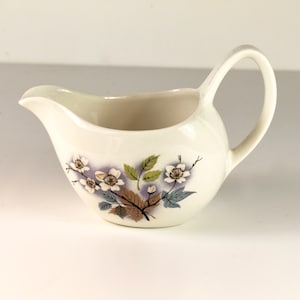 Midwinter Stylecraft fashion shape orchard blossom or cornfield gravy jugs.