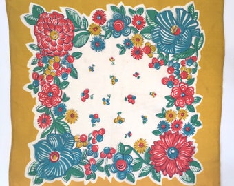 A vintage silk floral patterned handkerchief.