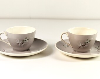 Five Royal Doulton &#39;frost Pine&#39; D6450 cups and saucers, plates, salad plate, jug and bowl