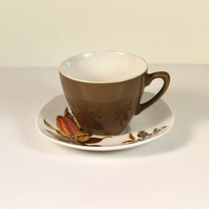 A Midwinter cornfield cup and saucer, and extra saucer