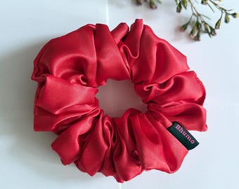 Coletero de satén rojo navideño