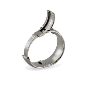 May include: A silver metal clamp with a hinged design. The clamp is open and ready to be used.