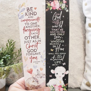 May include: Two decorative bookmarks with religious quotes. One bookmark has the text "Be Kind" and "Forgiving Each Other". The other bookmark has the text "For God so loved the world". Both bookmarks have floral and animal illustrations.