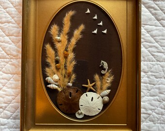 Vintage 70s shell art with dried floral flowers  framed wall hanging home decor 6 inch by 8”