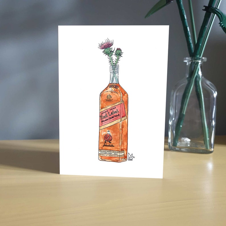 May include: A hand-drawn illustration of a bottle of Johnnie Walker Red Label Scotch Whisky with a bouquet of purple thistle flowers in the bottle's neck.