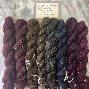 May include: A rustic wooden sign with the text "Welcome to our home" in white lettering. The sign features a distressed finish and a simple, inviting design, perfect for entryway decor.