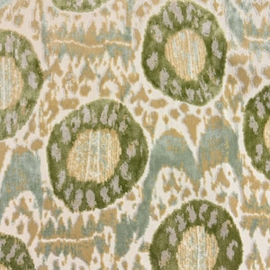 May include: A textile fabric featuring a repeating pattern of large, dark olive green circular shapes with textured edges. The background consists of soft beige and muted sage green abstract shapes, creating a layered, woven appearance throughout.