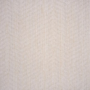 May include: A close-up of a textured, off-white fabric with a subtle vertical pattern. The fabric has a soft, fuzzy texture.