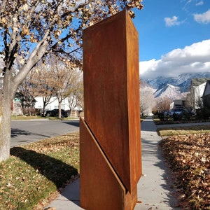 Levitation: Abstract geometric metal sculpture. Modern outdoor decor, yard art.