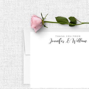 May include: White thank you card with the text "Thank You From Jennifer & William" printed in black cursive font.