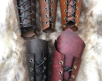 Pair Of Leather Bracers Three Belts Black