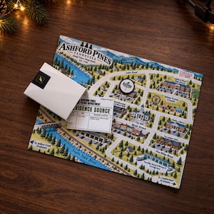 May include: A game board depicting the town of Ashford Pines, Tennessee, featuring illustrated roads, buildings, and a river. A white envelope labeled Evidence Source and a small circular token are placed on top of the map, which includes text labels.