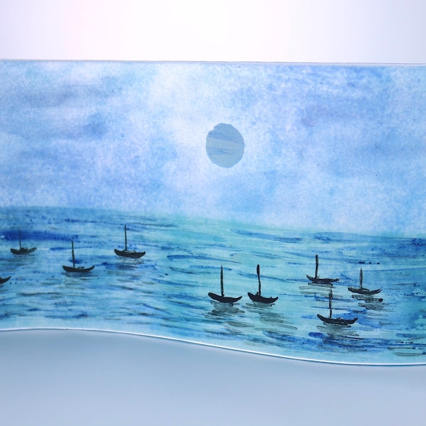 Fused glass wavy free-standing hand-painted moonlit sea panel with blue background and boat silhouettes