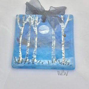 Greetings card with tiny fused glass decoration of hand-painted silver birches on a wintry moonlit background