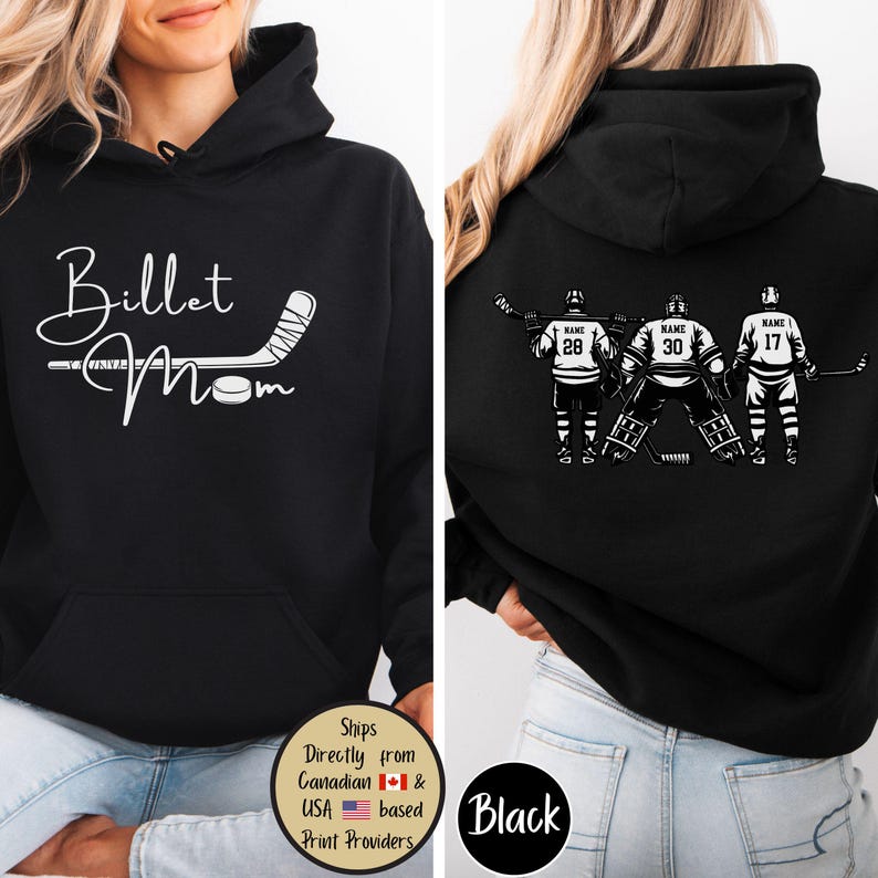 May include: Black hoodie with a front design that says "Billet Mom" with a hockey stick and puck. The back features a hockey team graphic with the word "NAME" above the numbers 28, 30, and 17. The hoodie has a front pocket and a hood.