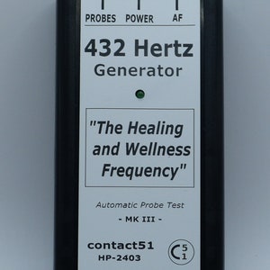 May include: A black and white device with a white label that reads "432 Hertz Generator" and "The Healing and Wellness Frequency". The device has a green light and the text "Automatic Probe Test - MK III - contact51 HP-2403 C 5 1" on the label.