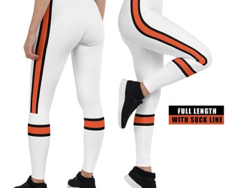 May include: White leggings with a wide orange stripe down the side and a smaller orange stripe at the ankle.  The leggings are full length and have a sock line.