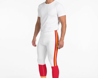 May include: A white short-sleeved t-shirt paired with white athletic leggings featuring a vertical red and yellow side stripe. The leggings have solid red lower sections with horizontal yellow and white bands at the ankles and white sneakers.
