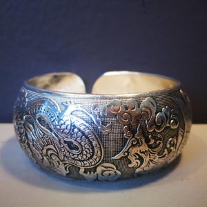 Silver dragon phoenix cuff bracelet, Adjustable 1 inch wide engraved embossed ethnic statement jewelry, Chinese mythical symbol gift