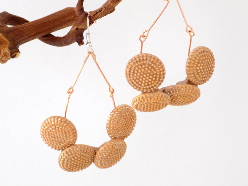 Pink gold rings design buttons with relief points