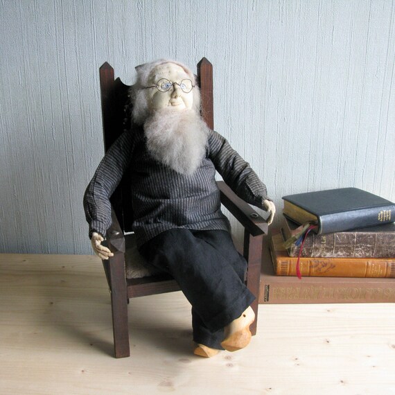 doll sitting in chair