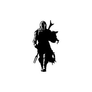 May include: A black and white silhouette of a figure in armor, holding a weapon and a helmet. The figure is walking forward, with a detailed helmet and armor design. The image is set against a white background, creating a stark contrast.