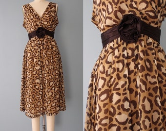 vintage designer silk dress | 90s Oscar De La Renta leopard print dress | silk rosette cummerbund dress