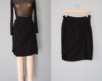 MaxMara sculpted mini skirt | black wool mini skirt | sculpted pleated designer skirt