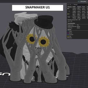 May include: A 3D model preview on a Snapmaker U1 interface showing a character wearing a black top hat and yellow sunflower-shaped glasses. The figure is surrounded by grey support structures with a filament usage table visible in the top right corner.