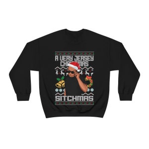 May include: Black Christmas sweater with a white and green pattern. The sweater features a man wearing a Santa hat and sunglasses with the text "A Very Jersey Christmas" and "Sitchmas".