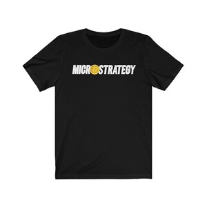 May include: Black t-shirt with white text that reads "MICROSTRATEGY" and a gold Bitcoin symbol.