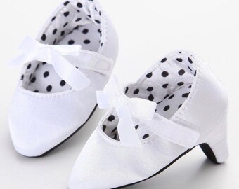 infant white pumps