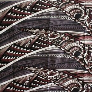 May include: A brown and white patterned fabric with a geometric design. The fabric has a satin-like sheen and is made of a soft, lightweight material.