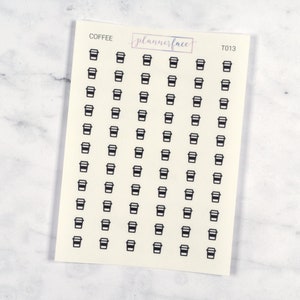 May include: A sheet of planner stickers with a black and white design of a coffee cup. The sheet is labelled "COFFEE" and "T013".