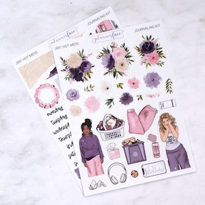 May include: A set of planner stickers with a purple, pink, and white floral theme. The stickers include a laundry basket, a trash can, a girl with a "Don't talk to me" speech bubble, and a variety of other cute illustrations. The stickers are labeled "J091 HOT MESS" and "JOURNALING KIT".