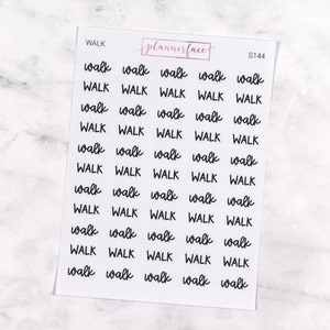 May include: A white sticker sheet featuring the word "WALK" repeated in a black, handwritten font. The sheet also includes the text "plannerface" and "S144". Ideal for planners and journals.