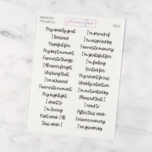 May include: A sheet of clear stickers with black text. The stickers are memory prompts for journaling or planning. The text includes phrases like "My weekly goal", "I learned", "Hopeful for", "Favourite memory", "I'm grateful for", "I'm feeling", "Excited for", "Weekly intention", "I'm motivated by", "Pleased that I", "I need to", "After this week", "Forever memory", "I've grown by".